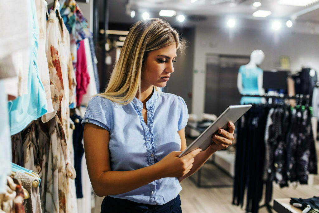 a woman looking at a tablet