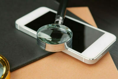 Conceptual image depicting conducting an online search for information with a magnifying glass