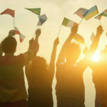 People holding different flags.